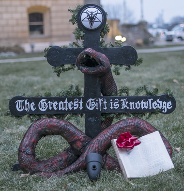 Illustration for article titled Satanic group, Christian senator put up